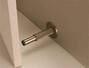 Massief messing gekartelde deurstopper